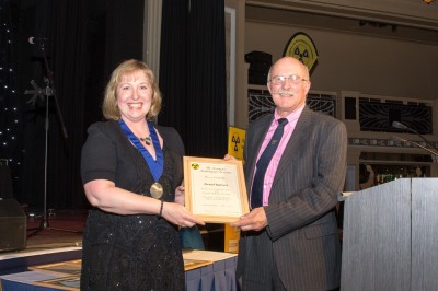 Arwel Barrett receiving Honorary Fellowship from Amber Bannon (SRP President) 
